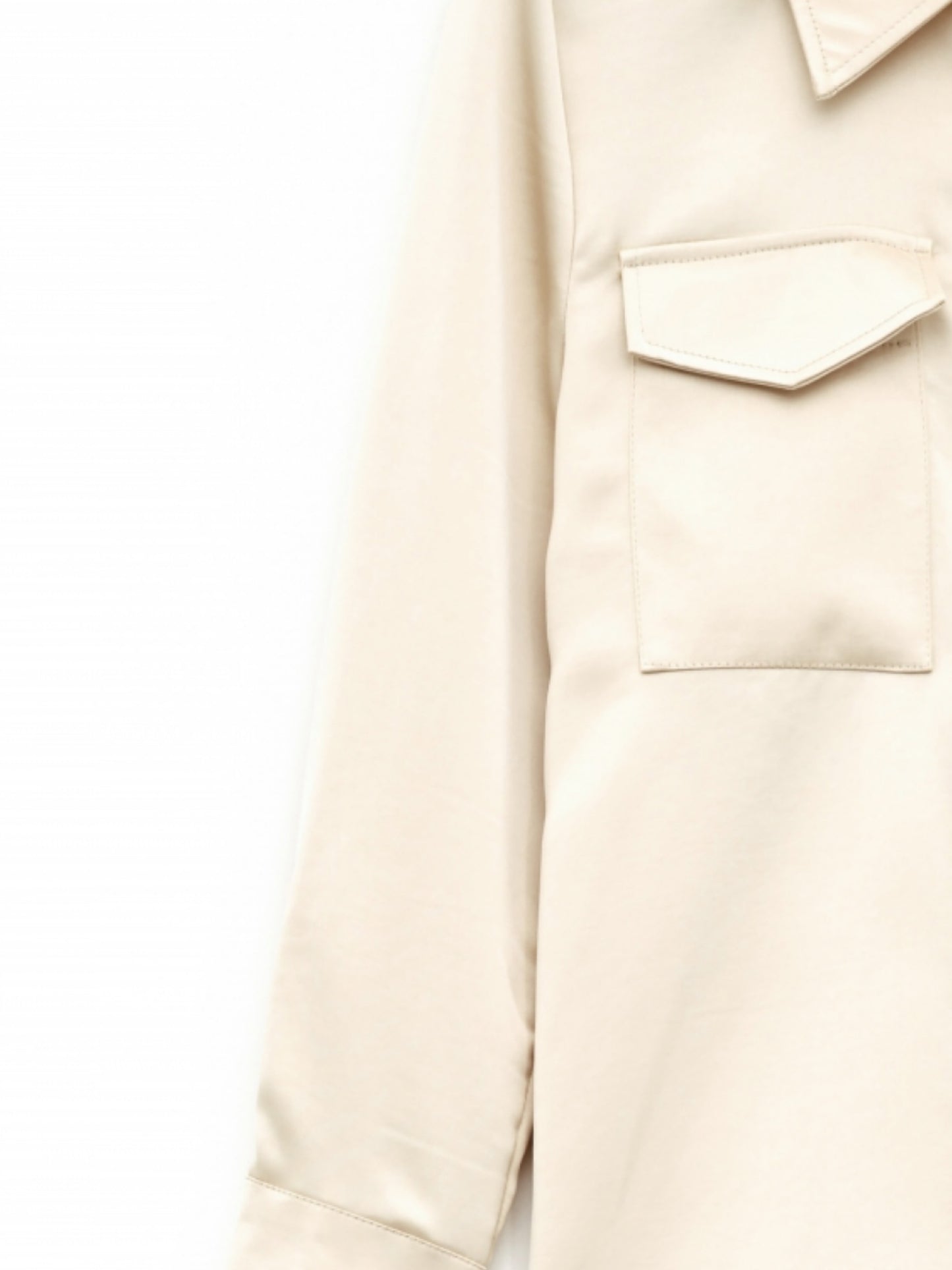Camisa bolsillos fluida
