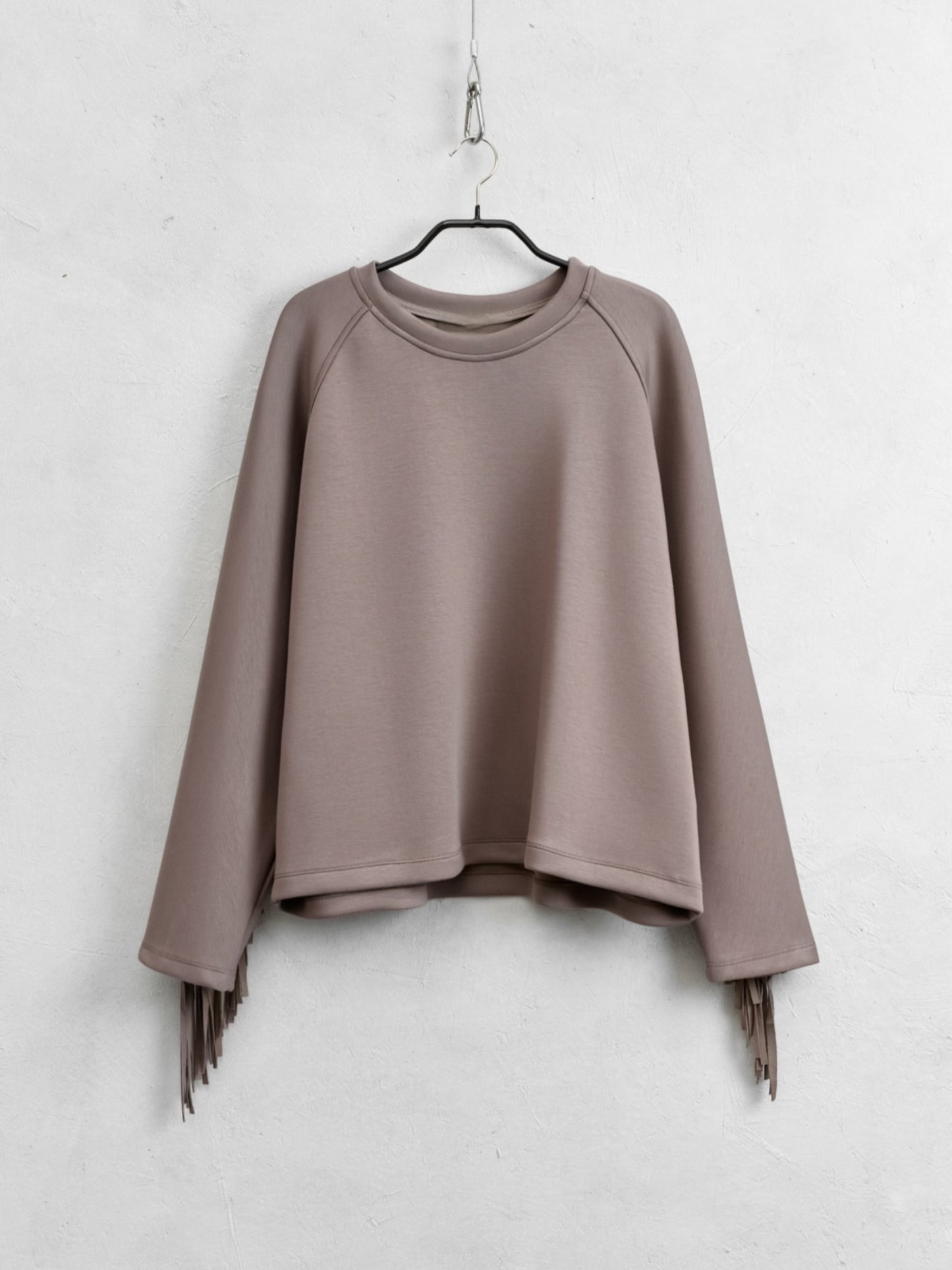Sudadera flecos