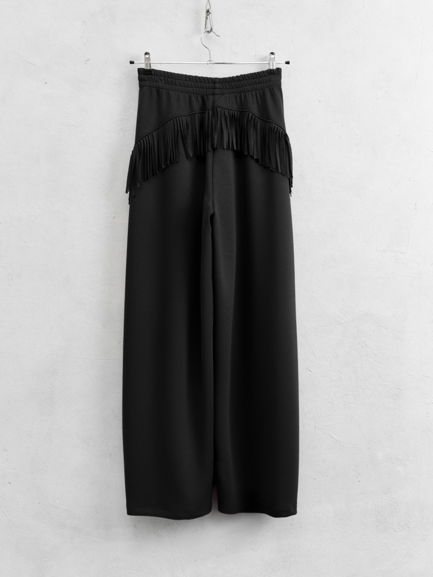 Pantalón sporty flecos