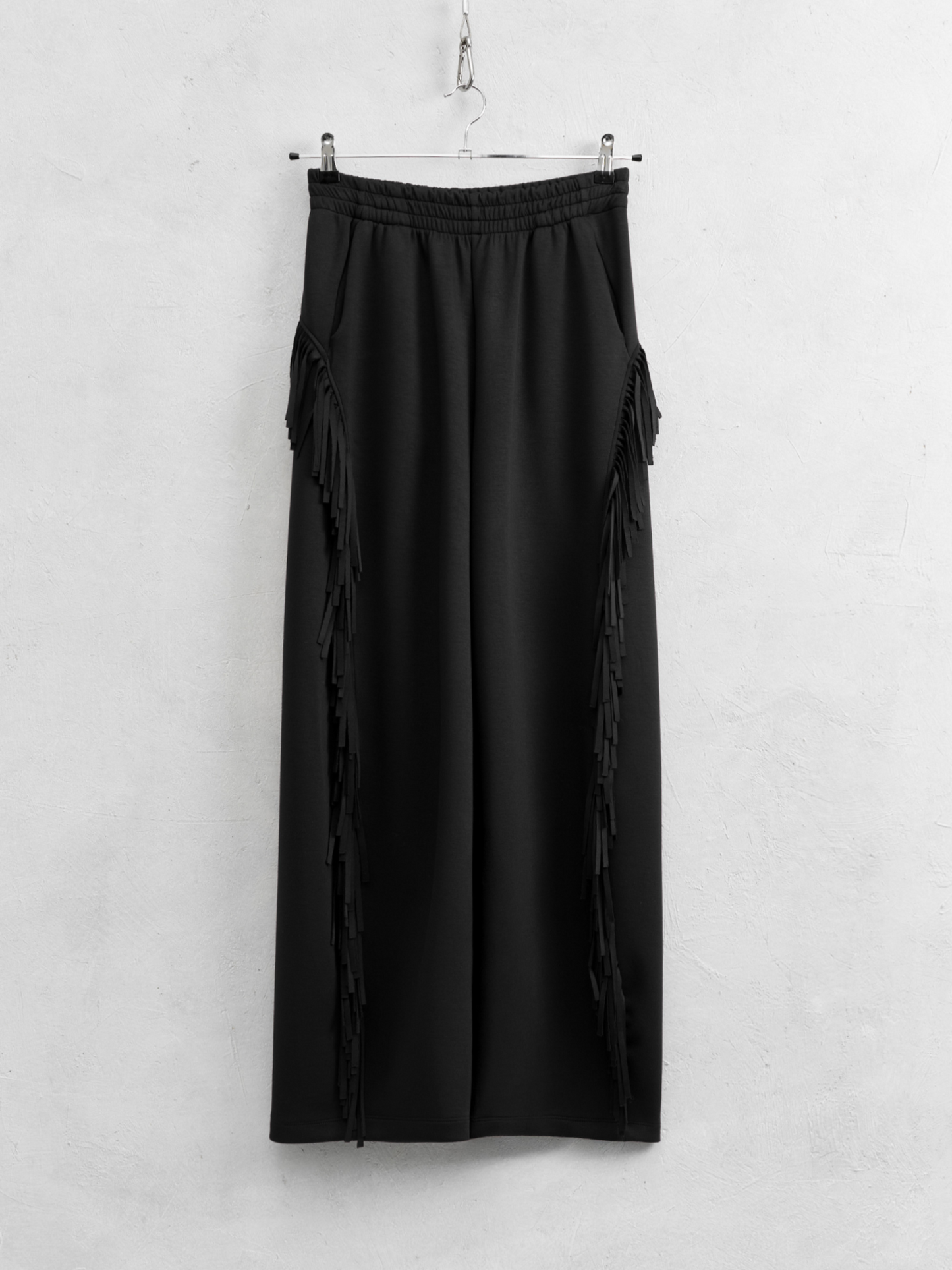 Pantalón sporty flecos